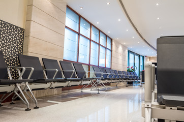 chair in the lobby of the airport