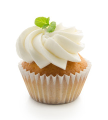 Cupcake with mint flavoured cream isolated on white background.