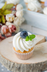 Summer cupcakes with blueberries and mint flavoured cream. Homemade.