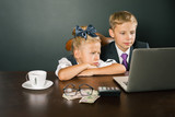 Business or school kids uses a laptop computer