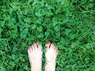 Barefoot on a fresh and juicy grass