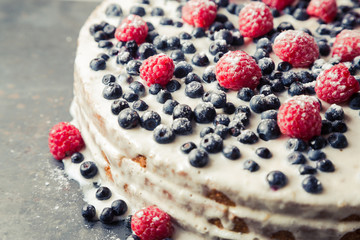 Homemade cake with blueberry and raspberry