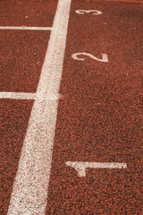 Running track first, second, third lines