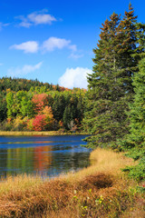Fall foliage along the Trout River in rural Prince Edward Island, Canada.