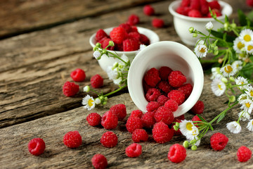 Fresh raspberries on a wooden table