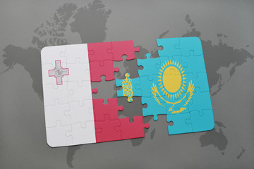 puzzle with the national flag of malta and kazakhstan on a world map background.