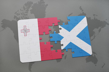puzzle with the national flag of malta and scotland on a world map background.