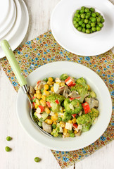 Dining salad: corn, peas, mushrooms, broccoli and crab sticks