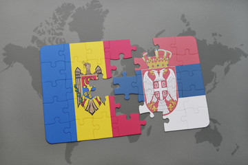 puzzle with the national flag of moldova and serbia on a world map background.