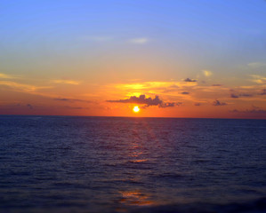 Naklejka na ściany i meble Caribbean Sunset Centered/Colorful Caribbean Sunset on the Ocean