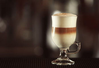 Latte on blurred bar background
