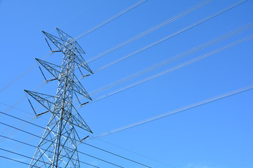 electric pole / Power pole voltage lines and the blue sky
