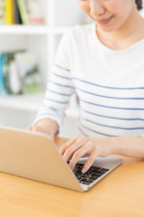 young asian woman relaxing in living room