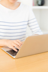 young asian woman relaxing in living room