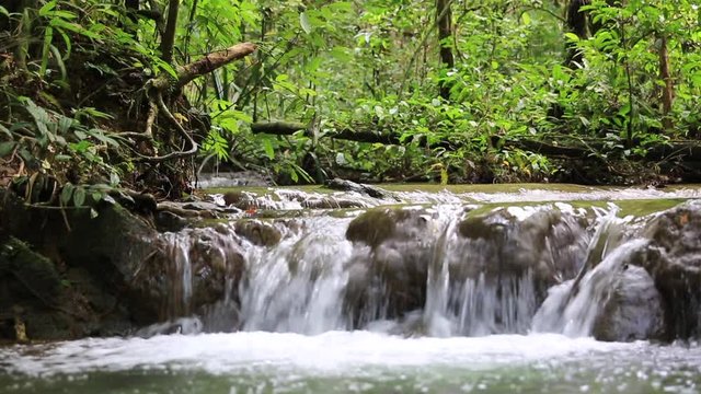 waterfall in tropical forests at sra nang manora forest park, Thailand