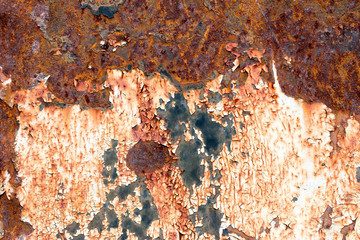 A background of peeling paint and rusty old metal