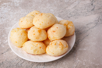 Brazilian snack cheese bread (pao de queijo) on plate