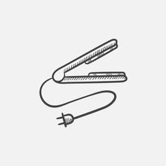 Hair straightener sketch icon.
