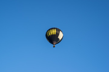 One air balloon fly in the blue sky, aerostate