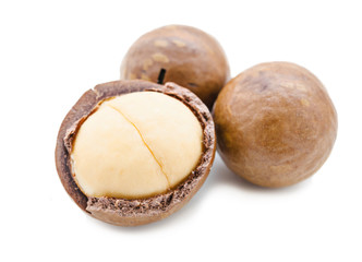 Shelled and unshelled macadamia nuts.