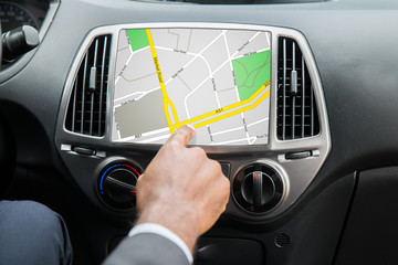 Person's Hand Using GPS Navigation System