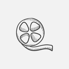 Film reel sketch icon.
