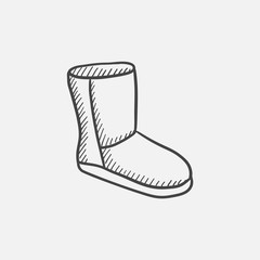 Fuzzy winter boot sketch icon.