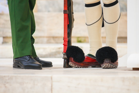 Close up image of an evzone's and main officer's feet during the traditional guard change on Syntagma square, Athens, Greece.