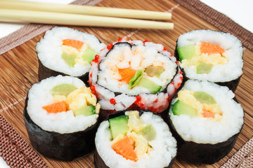 Fresh sushi with eggs and vegetables.