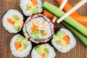 Fresh sushi with eggs and vegetables.