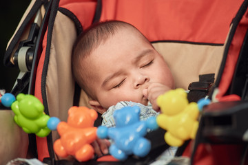 Obraz premium Sleeping baby outdoor