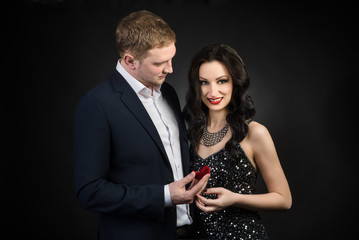 Man proposing engagement to girlfriend