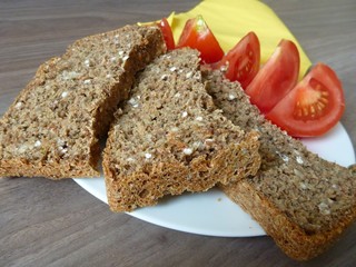 snack with slices of bread cheese and tomato