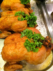 Grilled chicken on shelves in supermarket