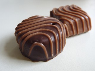 small decorated brown chocolate candy