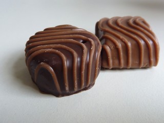 small decorated brown chocolate candy