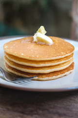 Stacked pancake on wooden table