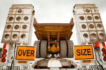 Over-size Mining Dump Truck on Float Trailer © vekidd