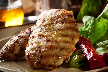 Grilled chicken breasts served with grilled paprika