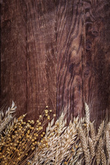 wooden background table ears of wheat