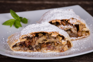 Slice of an apple strudel on a plate