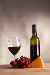 bottle of wine and glass on the table