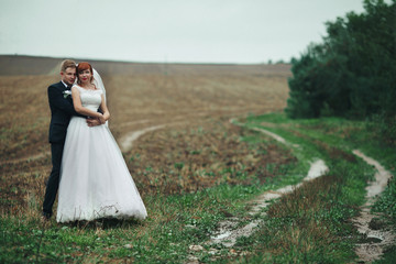 The couple in love stands in the park