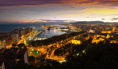 Fototapeta na wymiar Malaga with Port from castle in evening