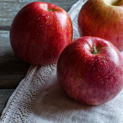 Red apples with drops of dew.