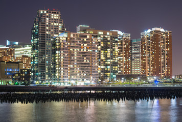 Fototapeta na wymiar Skyline of Lower Manhattan. Skyscrapers at night