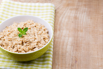 Oatmeal porridge with blueberries. healthy breakfast.