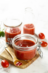 Homemade ketchup with tomatoes, chili and peaches