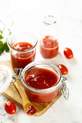 Homemade ketchup with tomatoes, chili and peaches