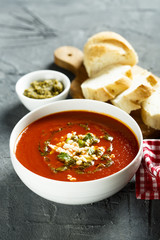 Tomato soup with cheese and pesto sauce